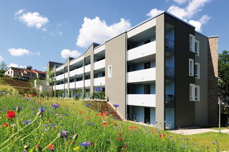 Residents on all four floors can only access their flats via partially covered balconies.