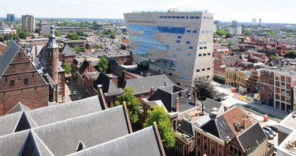 The tapered monolith shoots up into the sky out of the otherwise historical heart of the city.