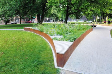 Convex and concave curves give the custom-made planting system an vibrant, organic look.