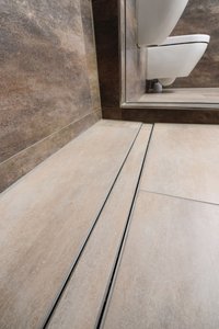 The precisely-fitting design of the channel means it can be installed flush into the accessible shower niche. 