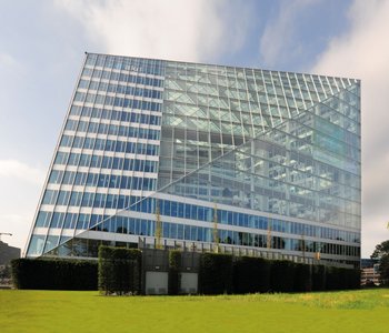 The back of the office building offers a view of the building’s generously proportioned atrium.