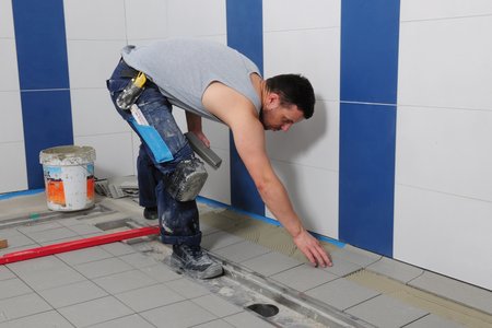 To finish, tile adhesive was applied before the tiles were set and subsequently grouted.