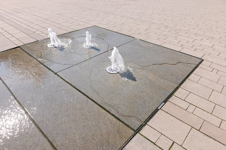 Three fountains represent the castles in and around Lüdinghausen, marked out on a map engraved in natural stone. 