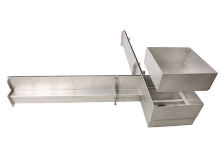 The metal products manufacturer custom-made all products for the project. This image shows the heavy-duty slotted channel combined with a drainage unit.