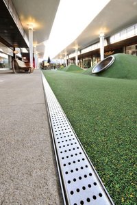 The channels border the children’s play areas, enabling rainwater to drain away quickly.