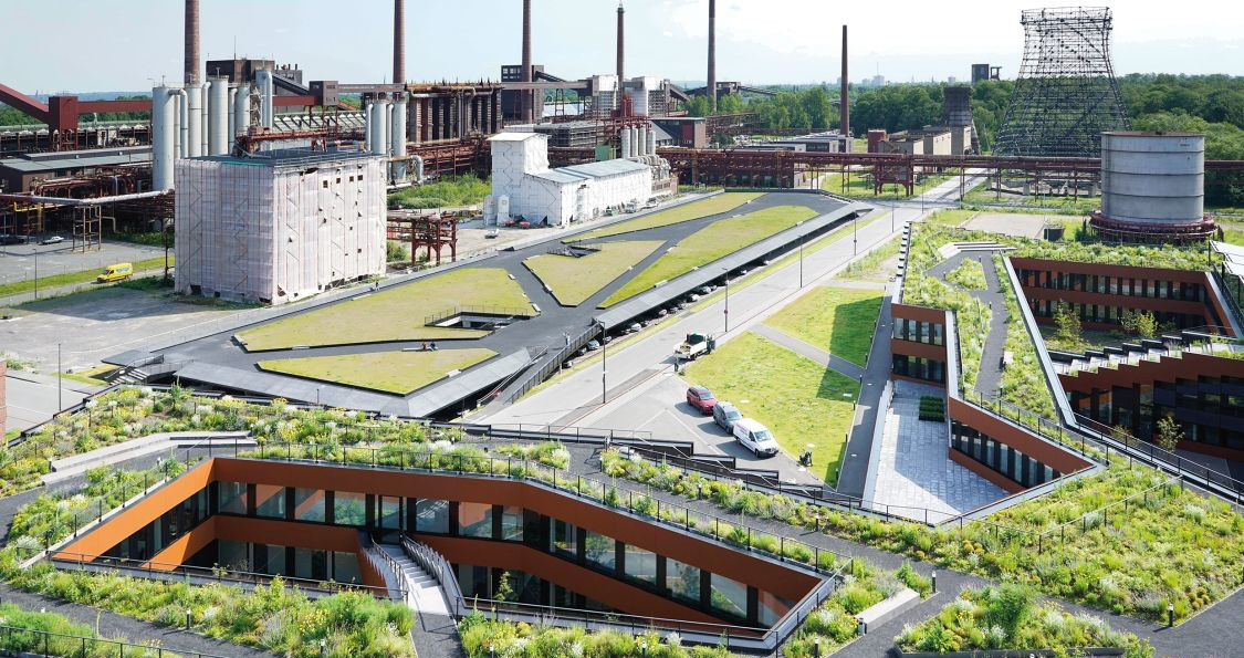 Culture meets nature in the construction of a new car park and administration building for the RAG-Stiftung and RAG AG on the grounds of Zollverein Coal Mine Industrial Complex in Essen.