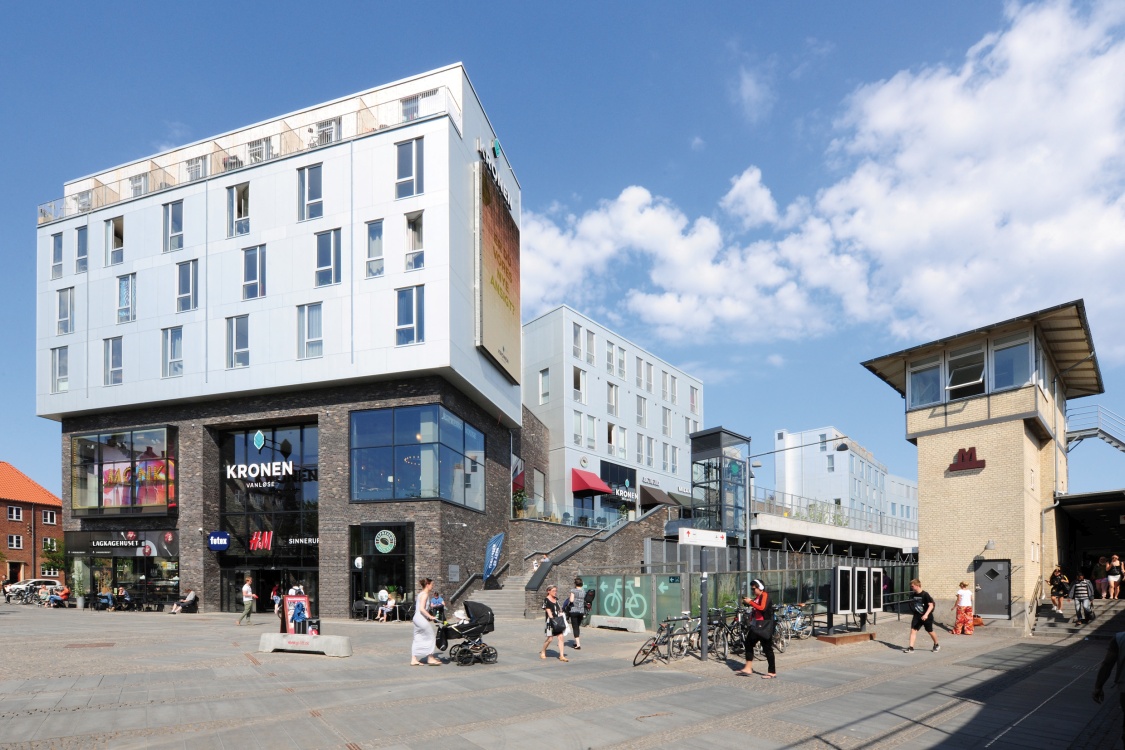 A unique building complex has emerged in the Vanløse district of Copenhagen, combining modern living with a myriad of shopping options. 
